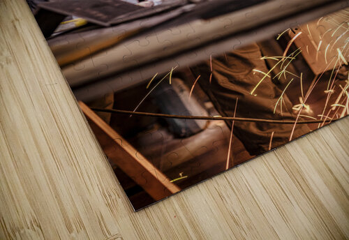man with grinder in action Gualtiero Boffi puzzle