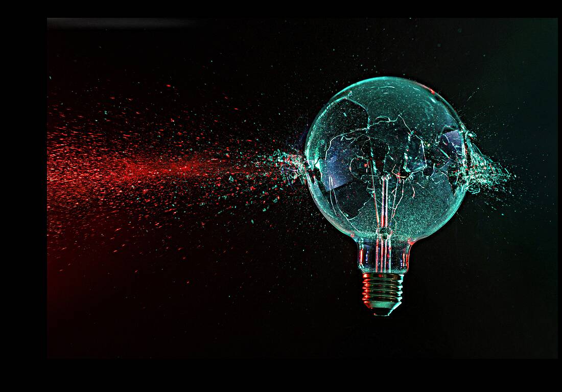 large green bulb exploding on a black  Reproduction