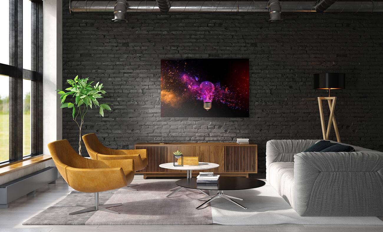 Exploding light bulb concept on dark background Reproduction