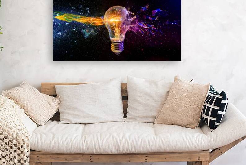 Exploding light bulb with colorful fragment splash by Gualtiero Boffi