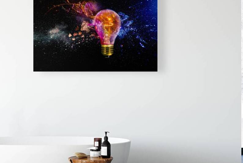 Exploding light bulb with colorful sparks by Gualtiero Boffi