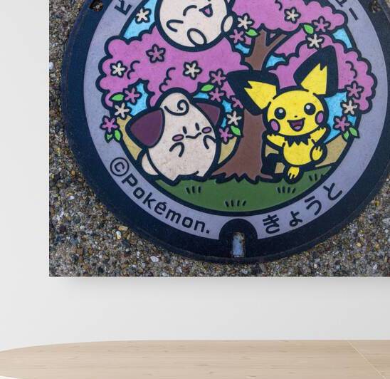 manhole cover depicting Pokemon characters by Gualtiero Boffi