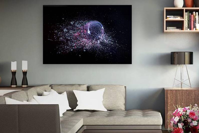 explosion of a glass ball on a black background.  by Gualtiero Boffi