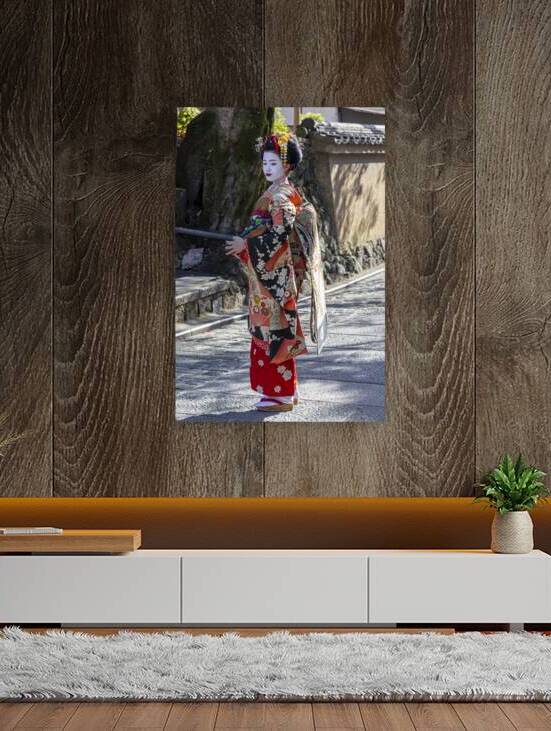 Maiko walks the streets of Kyoto  by Gualtiero Boffi