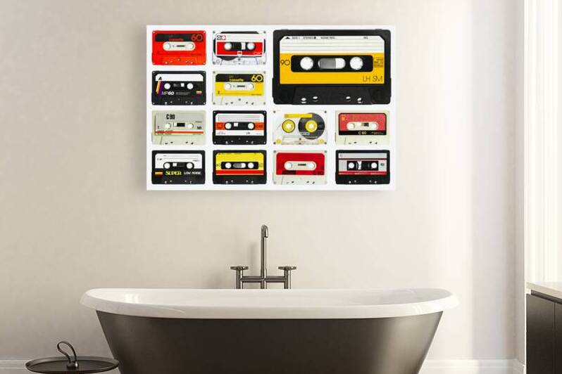 old audio cassette collection on a white  by Gualtiero Boffi