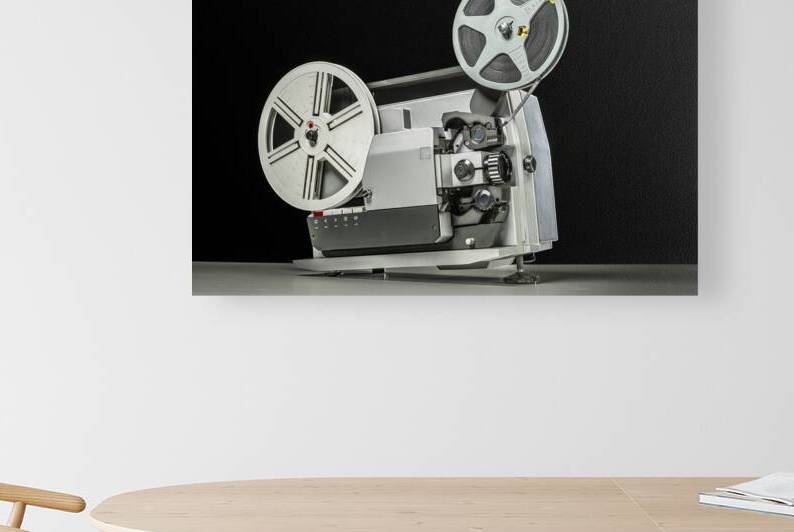 vintage super 8 projector on black  by Gualtiero Boffi