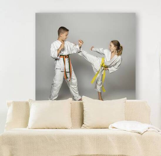 kids practise martial arts by Gualtiero Boffi