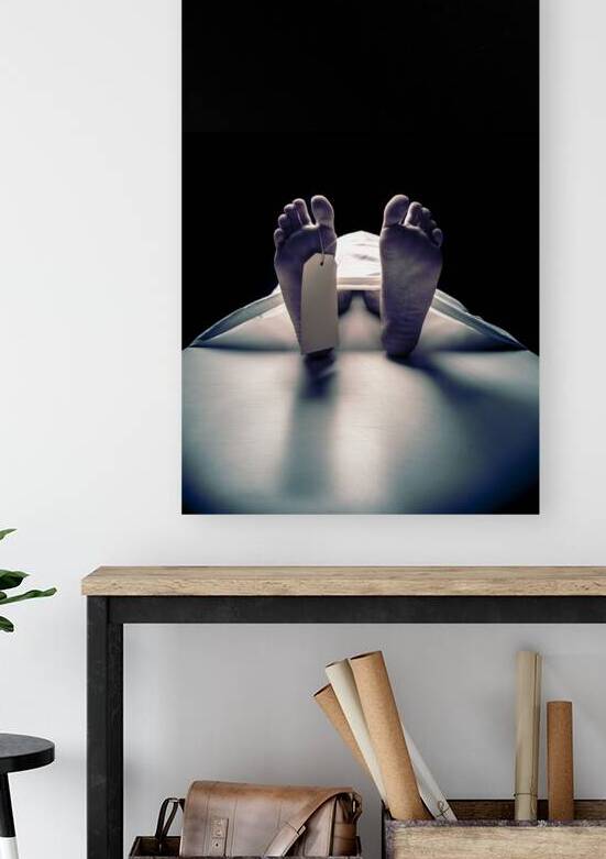 close-up of a dead mans feet on the mortuary table by Gualtiero Boffi