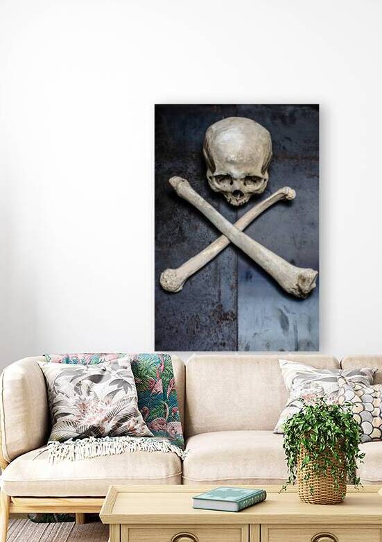 skull and thighbones on a metal by Gualtiero Boffi