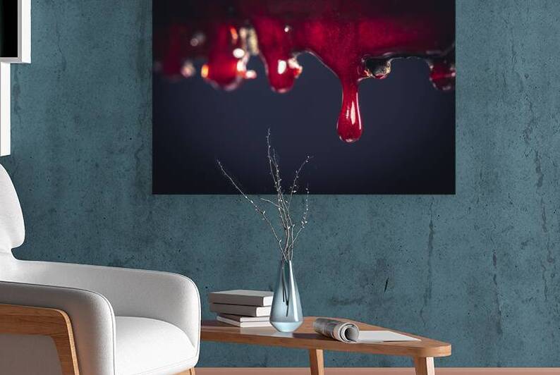 drop of blood on chainsaw blade by Gualtiero Boffi