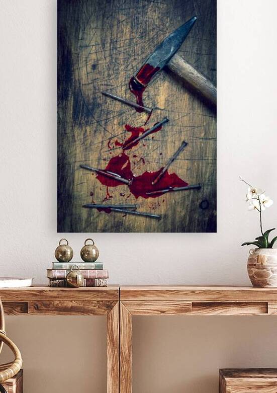 hammer and bloody nails on a wooden by Gualtiero Boffi