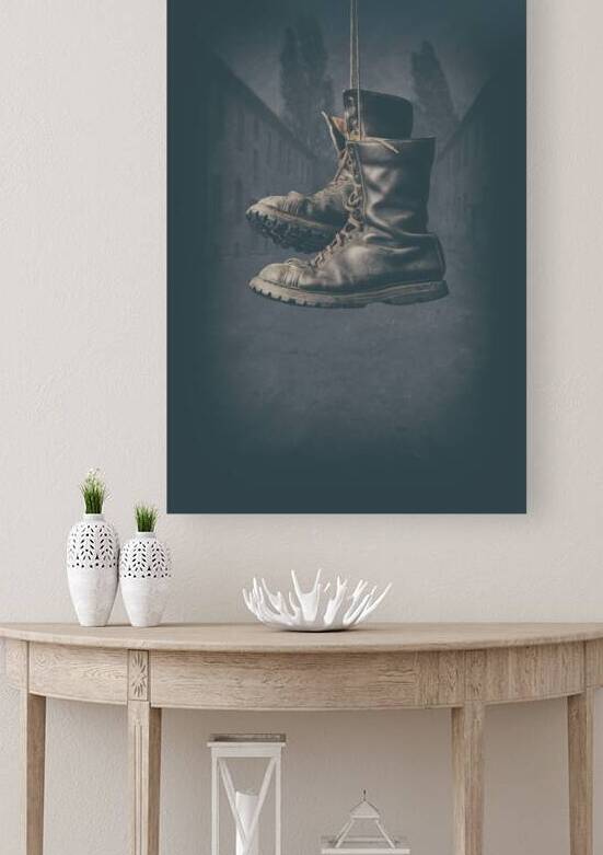 hanging leather military boots  by Gualtiero Boffi