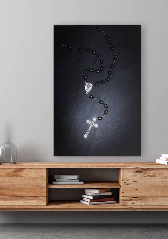 rosary with crucifix on black slate  by Gualtiero Boffi