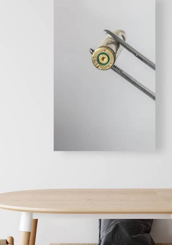brass casing held  by Gualtiero Boffi