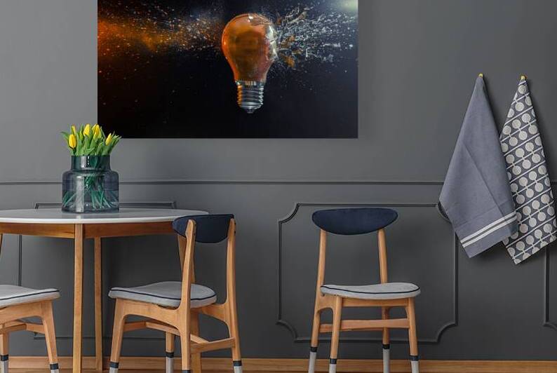 explosion of an orange bulb  by Gualtiero Boffi