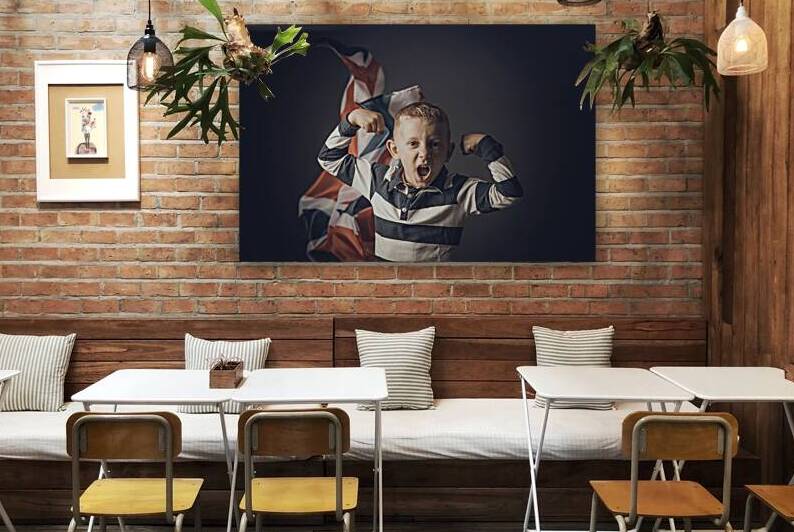 portrait of jubilant child and English flag by Gualtiero Boffi