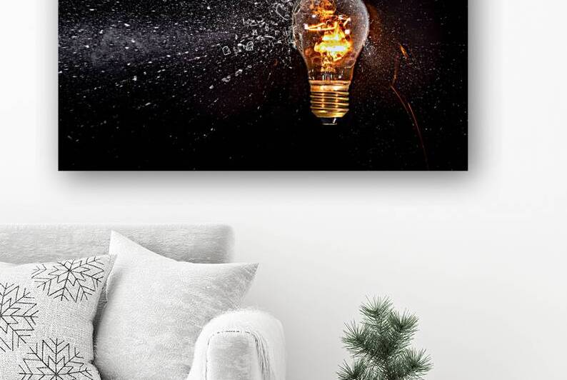 lit bulb hit by projectile  by Gualtiero Boffi