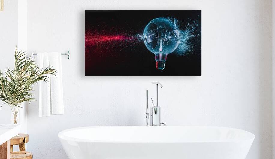 large blue bulb shatters and creates fragments  by Gualtiero Boffi