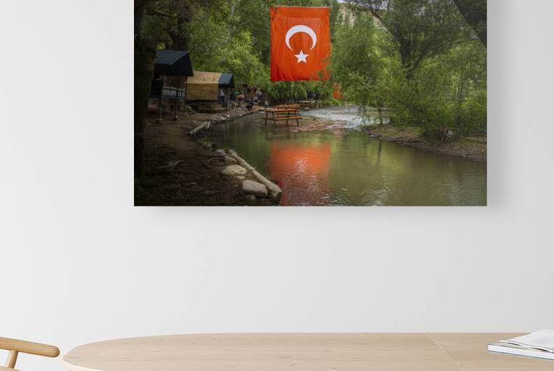 tables and restaurants on the river in the ihlara valley  by Gualtiero Boffi
