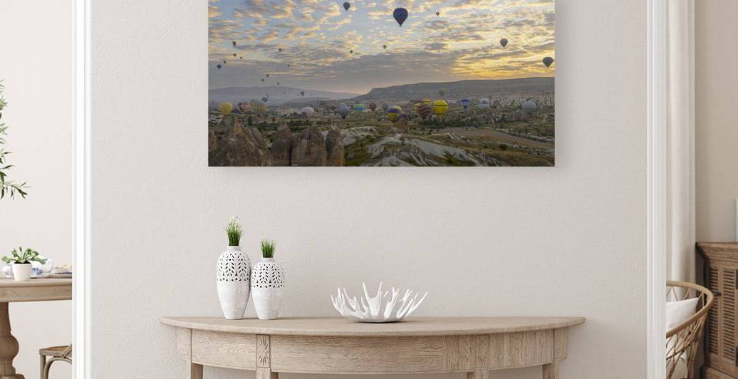 hot air balloon flies in the sky at dawn by Gualtiero Boffi