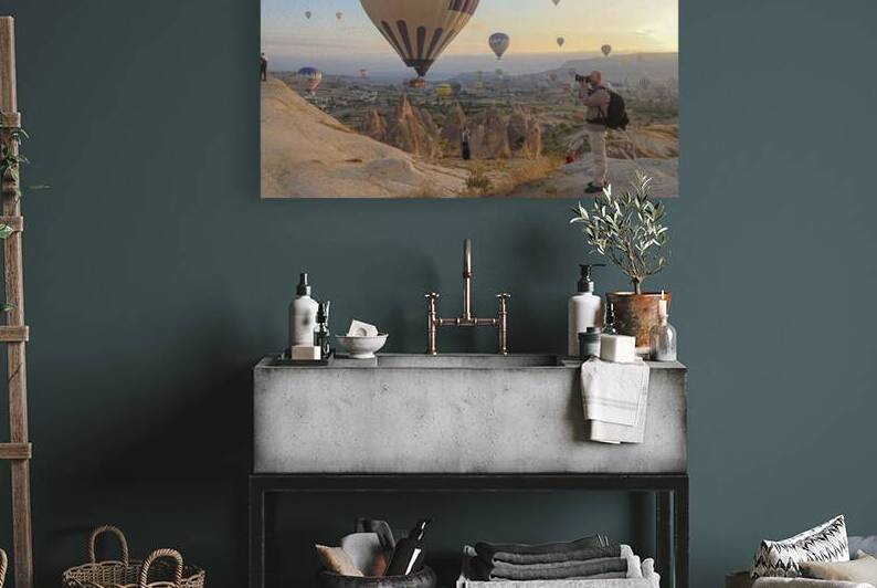 photographer intent on photographing the hot air balloons flying by Gualtiero Boffi