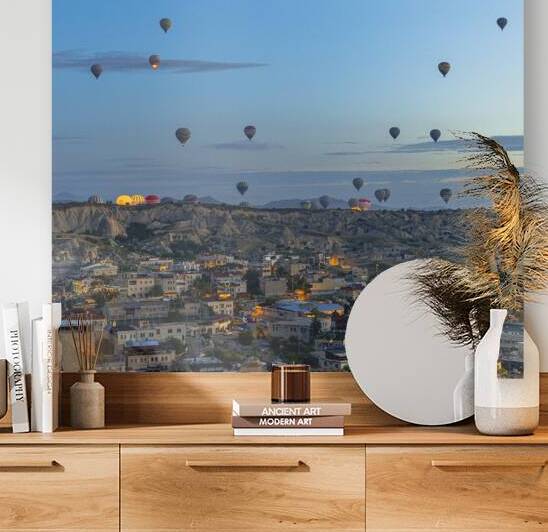 hot air balloons fly at sunrise by Gualtiero Boffi