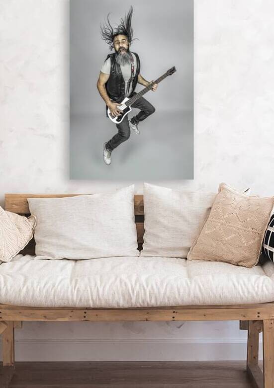 electric bass player jumps by Gualtiero Boffi