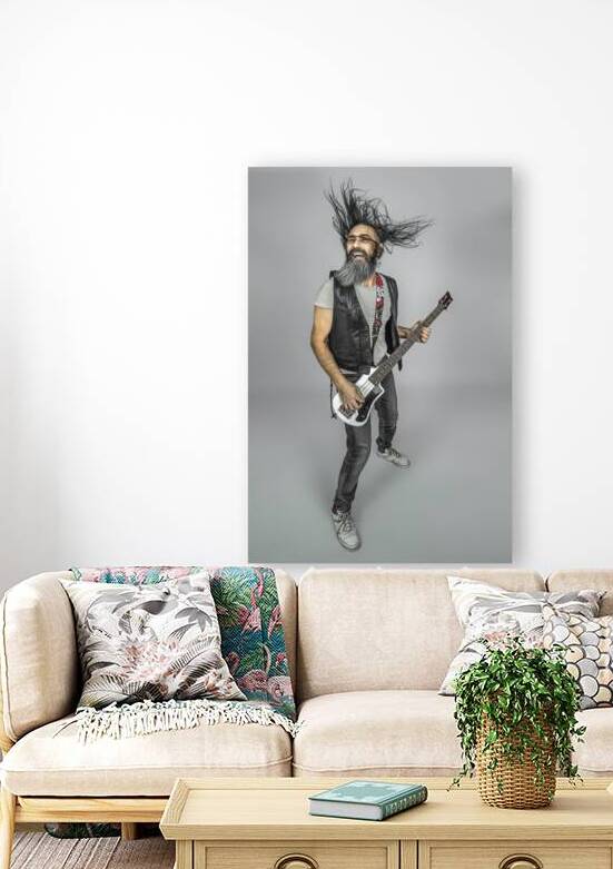 man with long fluttering hair plays bass guitar by Gualtiero Boffi