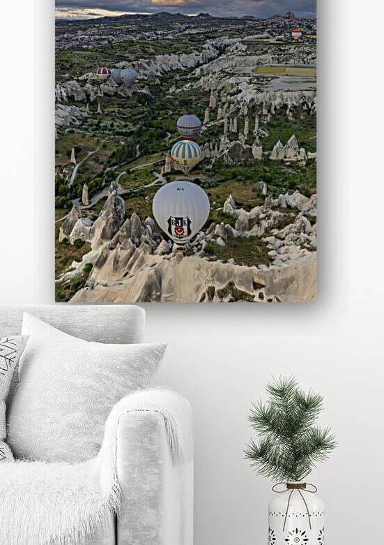 colorful hot air balloons fly at sunrise near goreme vie from b by Gualtiero Boffi