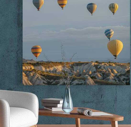 hot air balloons flying over the hills by Gualtiero Boffi