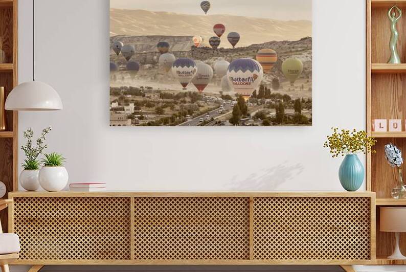 colorful hot air balloons take flight over the city of goreme at by Gualtiero Boffi