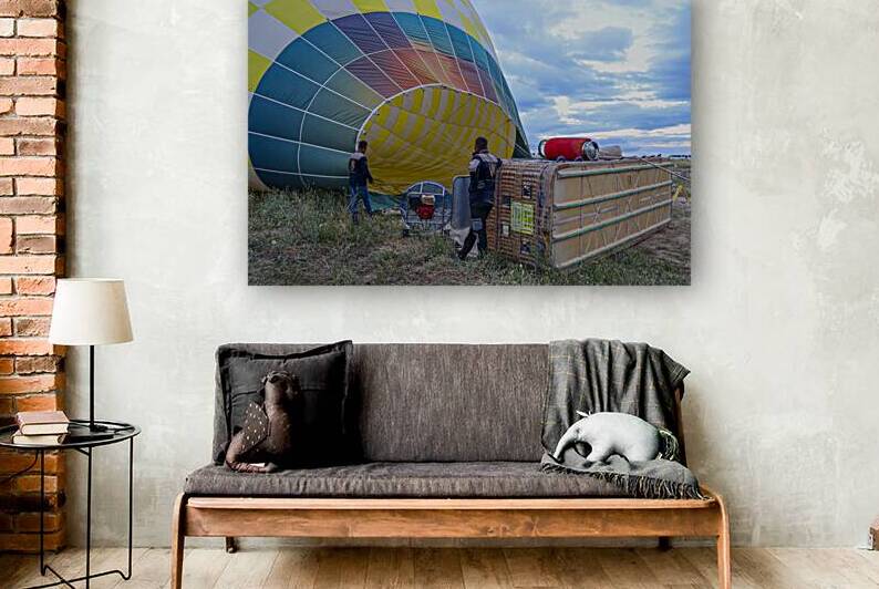 en inflate the balloon to prepare for the tourist flight.  by Gualtiero Boffi