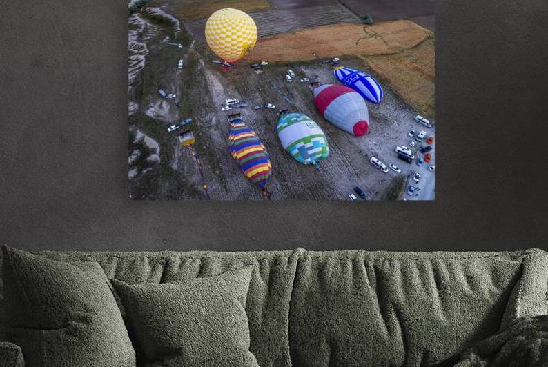 hot air balloons are deflated after the tourist flight. by Gualtiero Boffi