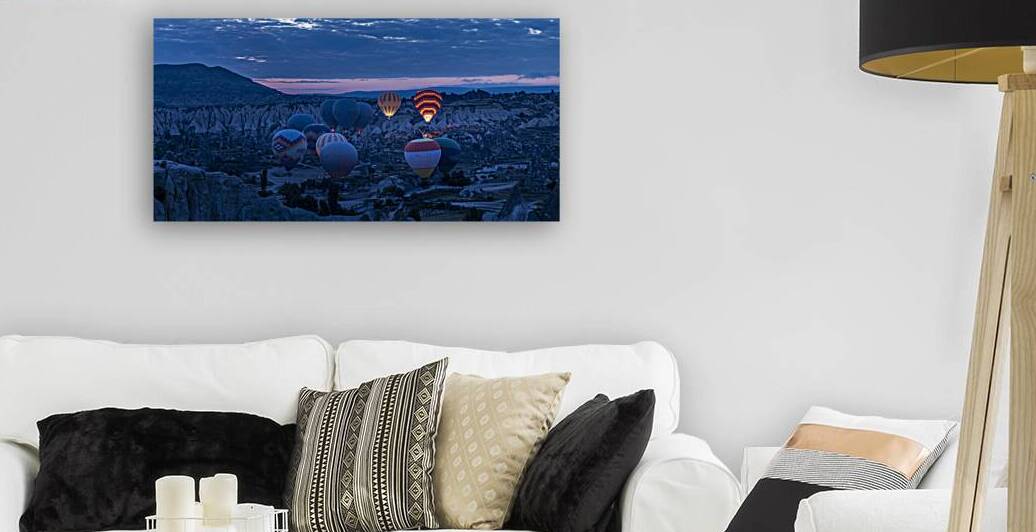 hot air balloons fly over the city at dawn by Gualtiero Boffi