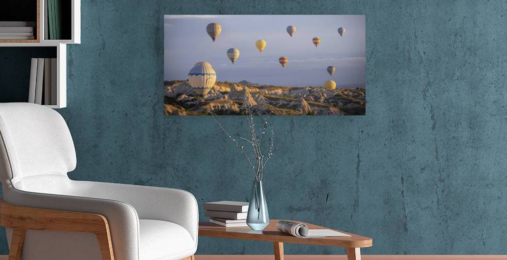 colorful hot air balloons fly at sunrise near goreme by Gualtiero Boffi