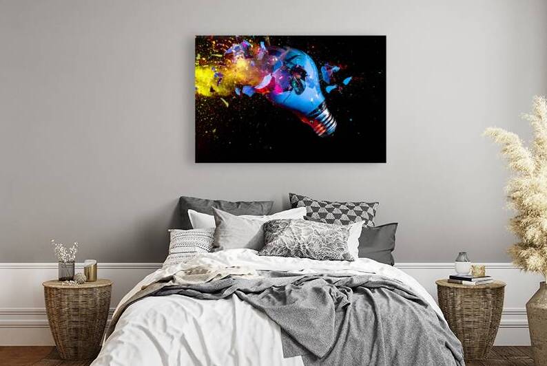 colorful electric light bulb exploding by Gualtiero Boffi