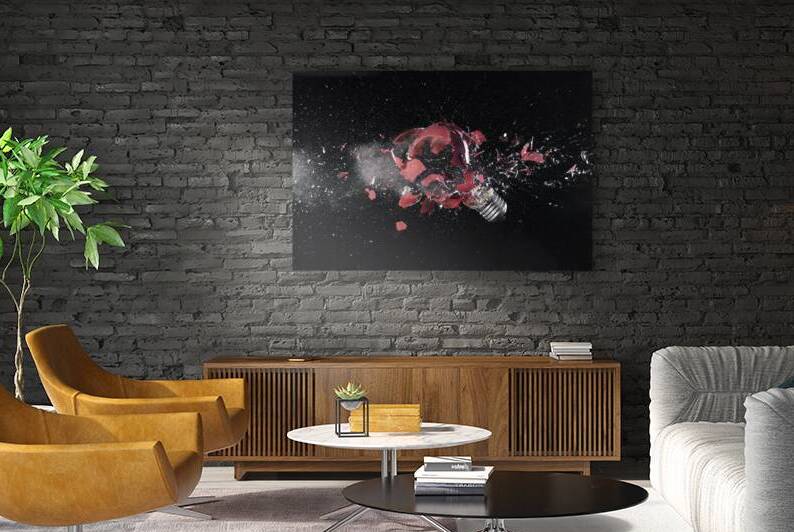 impact explosion of a red light bulb  by Gualtiero Boffi