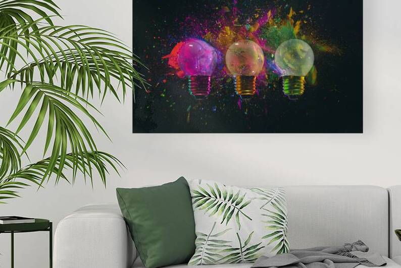 explosion of 3 colored light bulbs  by Gualtiero Boffi