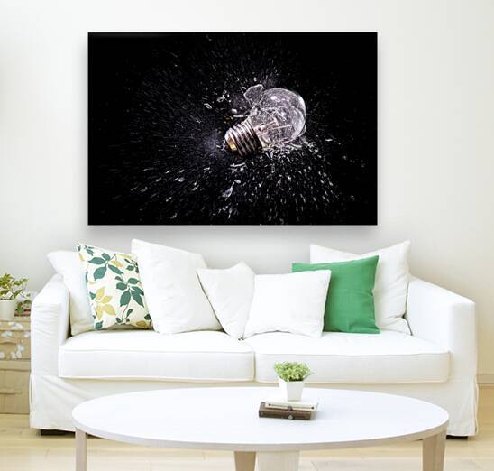 moment of impact explosion of a traditional light bulb  by Gualtiero Boffi