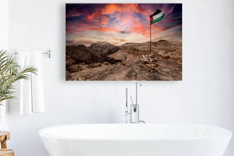 jordan flag on the mountains near petra. by Gualtiero Boffi