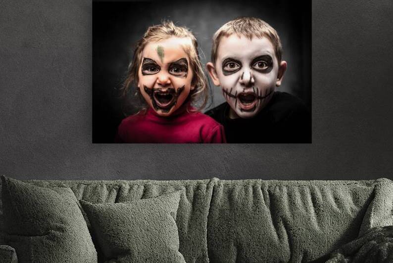 children with face made up for halloween party. by Gualtiero Boffi