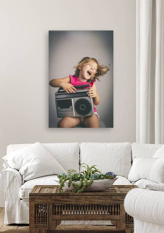 little girl has fun listening to music  by Gualtiero Boffi