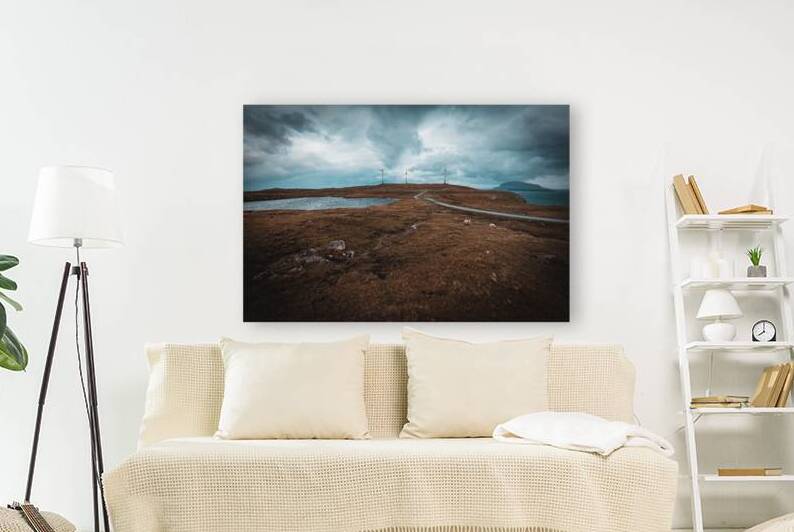 Windmills on the hills of the Faroe Islands.  by Gualtiero Boffi