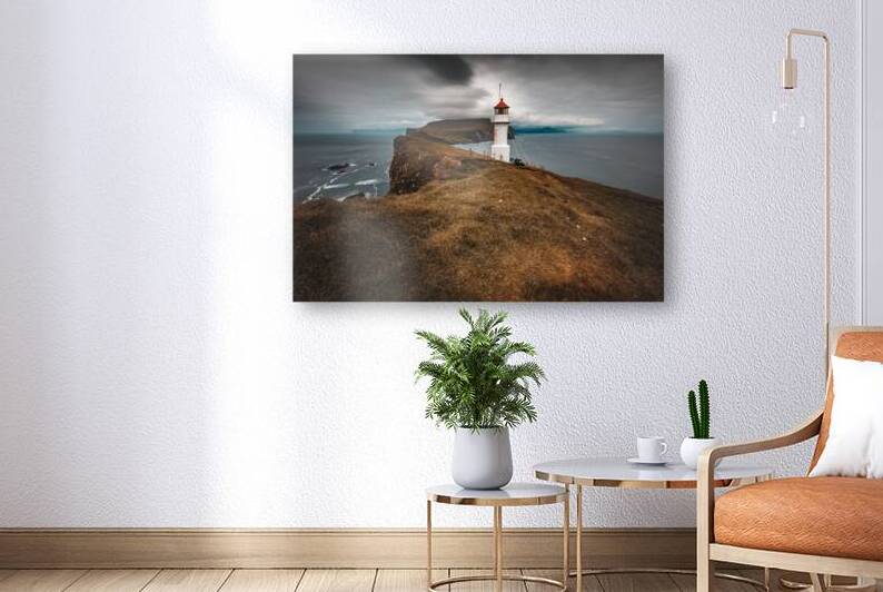 lighthouse on the island of Mykines Faroe. by Gualtiero Boffi