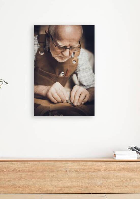 old carpenter at work by Gualtiero Boffi