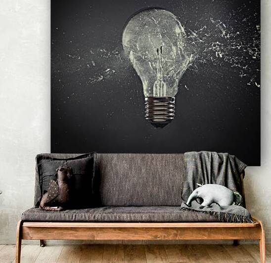closeup of glass bulb explosion by Gualtiero Boffi