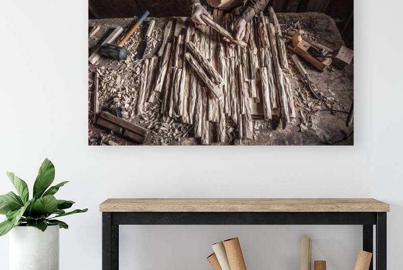 carpenter in workshop by Gualtiero Boffi