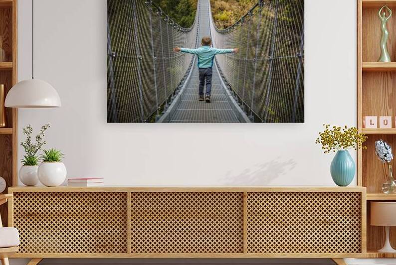 kid on suspended bridge  by Gualtiero Boffi
