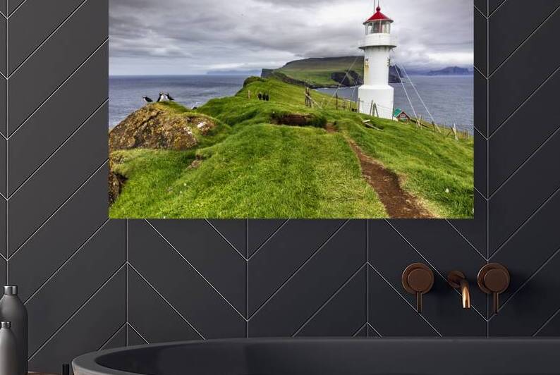 lighthouse in mykines  by Gualtiero Boffi