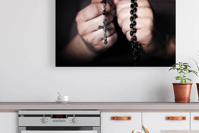 hands and rosary by Gualtiero Boffi